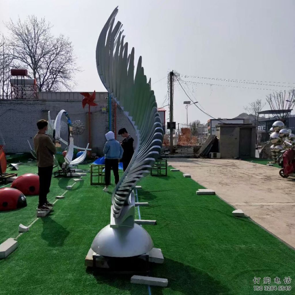 校園翅膀雕塑供應(yīng)商，拉絲景觀雕塑，抽象主題