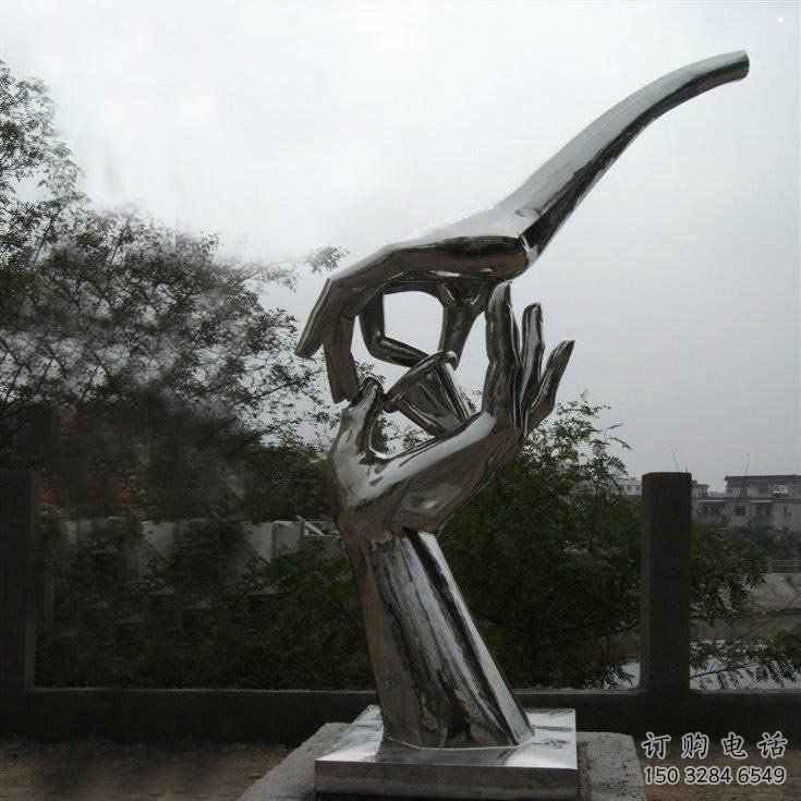 手拈花雕塑制造商，小區(qū)擺件，不銹鋼手拈花雕塑制造廠家