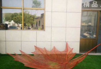 鏤空樹葉雕塑制造，藝術(shù)擺件，鐵藝樹葉雕塑訂做廠家