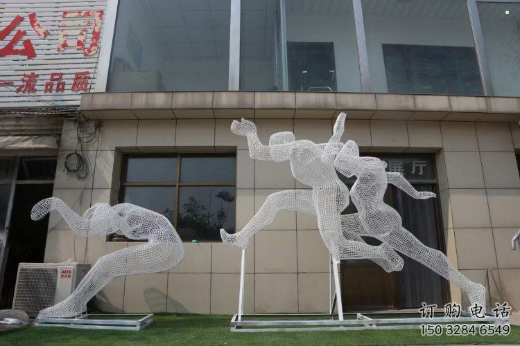 鏤空體育雕塑常用，公園小品，鐵藝運動人物雕塑生產(chǎn)商