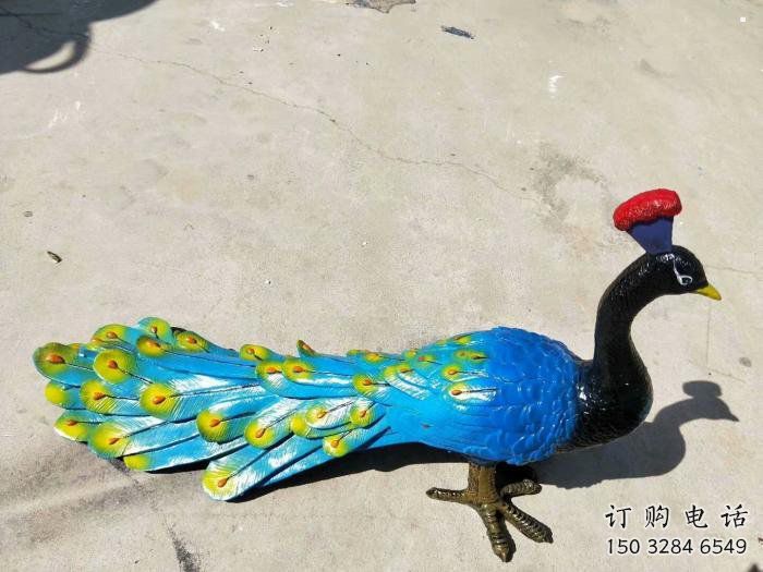 金昌彩繪孔雀雕塑制作選用，景區(qū)案例，動物美陳雕塑
